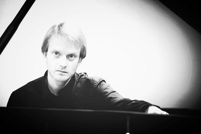 Pavel Yeletskiy seated at the piano